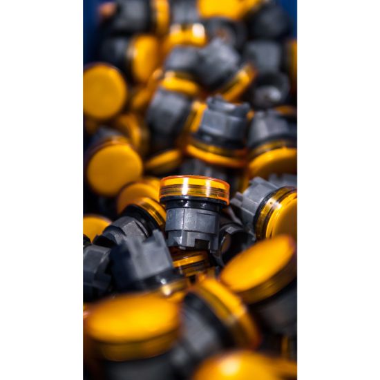 Picture of Head for illuminated push button, Harmony XB5, orange flush, 22mm, universal LED, spring return, clear boot, unmarked